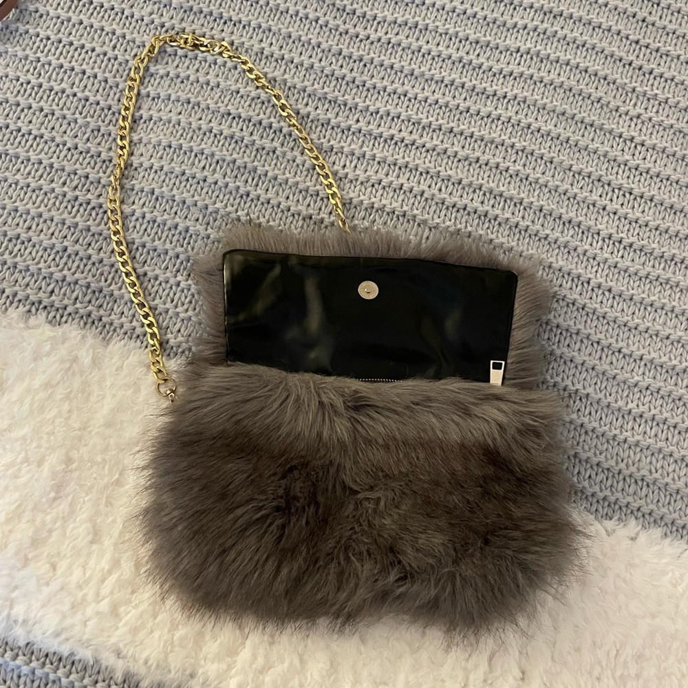 Fluffy purse with chain belt